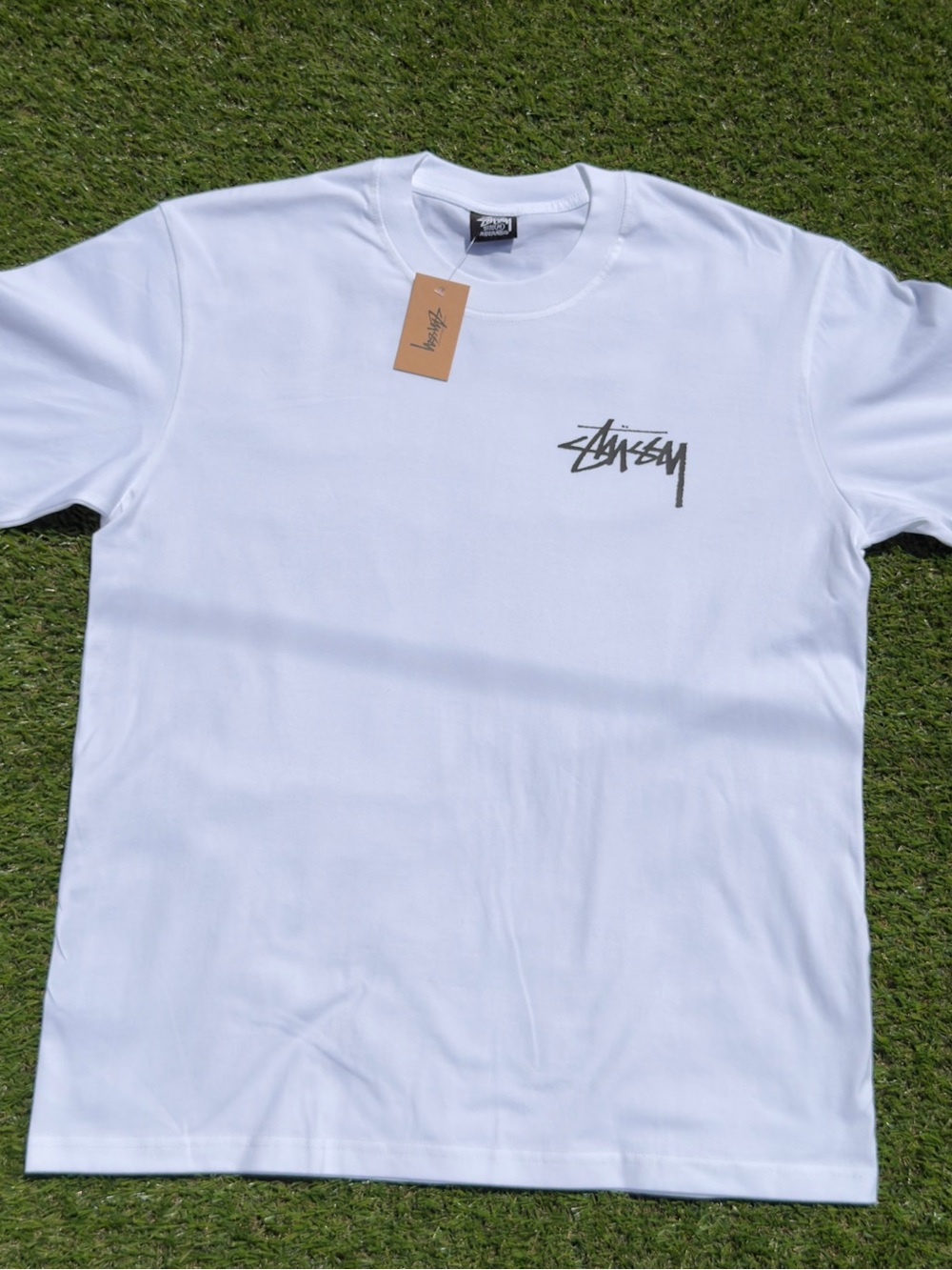 Stussy White Tee with Black Chest Logo